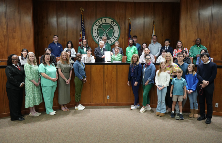 Group of American and Japanese friends in the council  chambers.